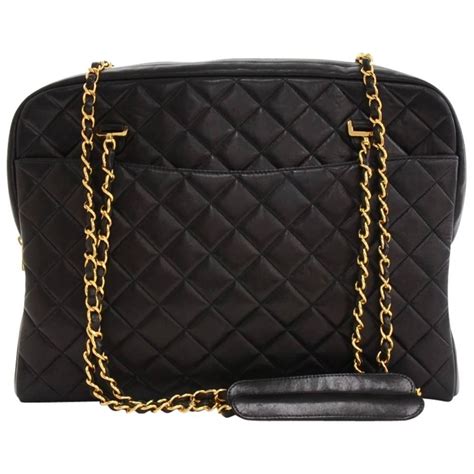 black Chanel bag gold chain